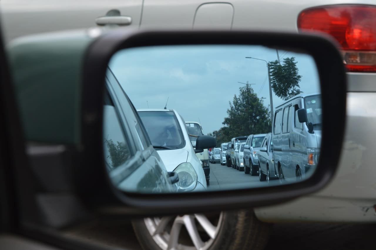 Traffic Jam Through a Car Mirror Traffic jam seen through a car mirror.
