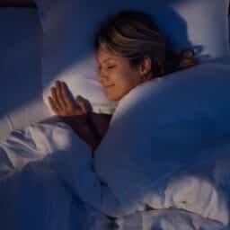 Woman sleeping in bed