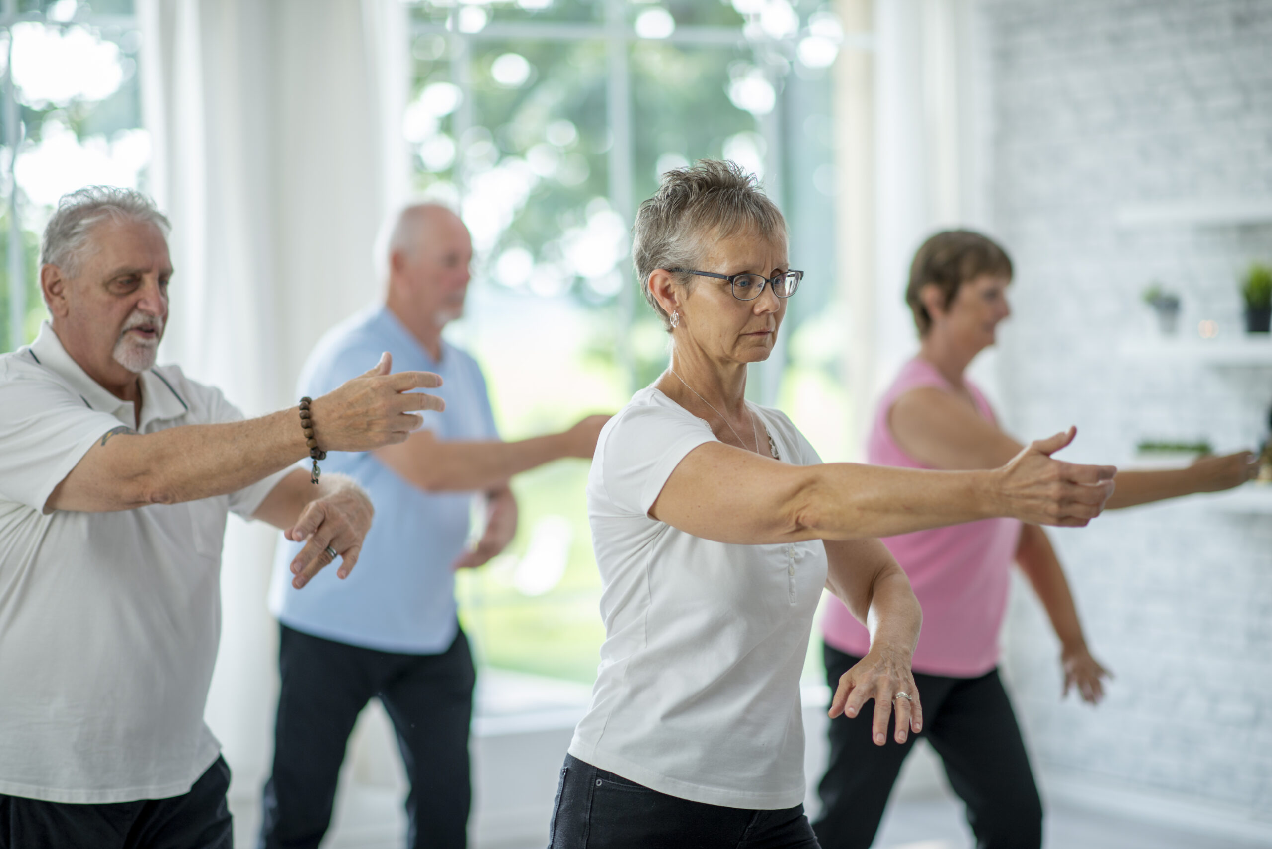 Tai Chi class; students practice balance and mindfulness.
