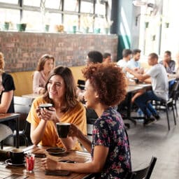 Crowded cafes and restaurants can reach noise levels that are hazardous for hearing.